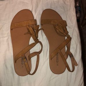 Tan sandals with tassels
